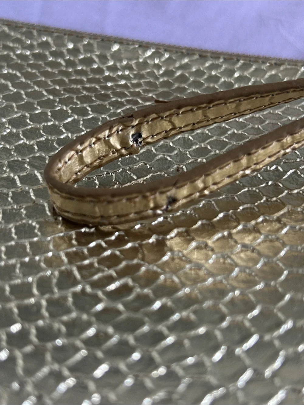 Sharif metallic snakeskin-embossed zip wristlet